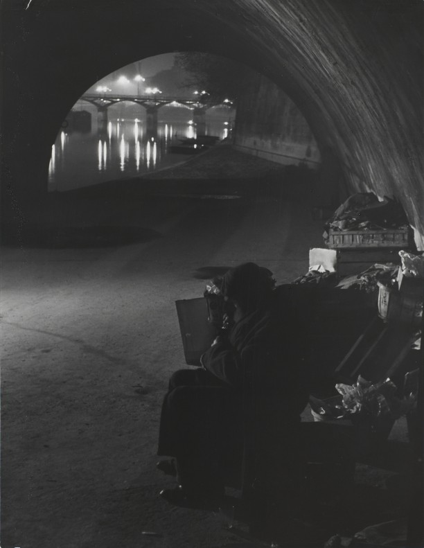 Clochards under the Pont-Neuf. In the distance, the Pont des Arts