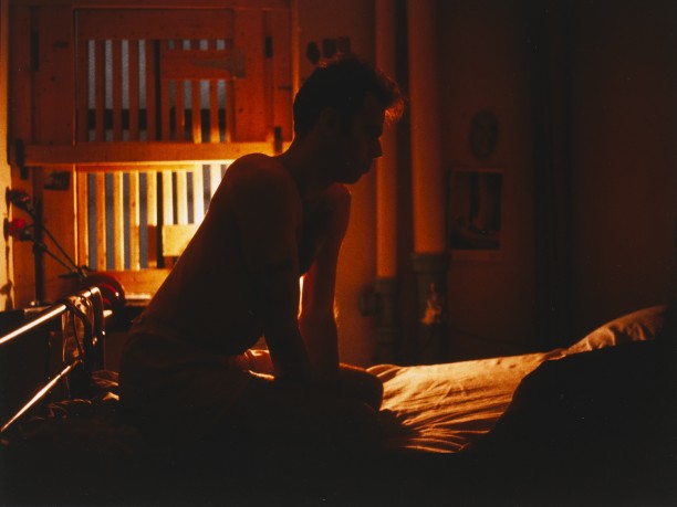Brian on my bed with bars, New York City