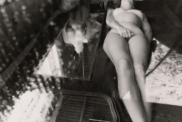 Untitled: Woman Laying Next to Another's Reflection