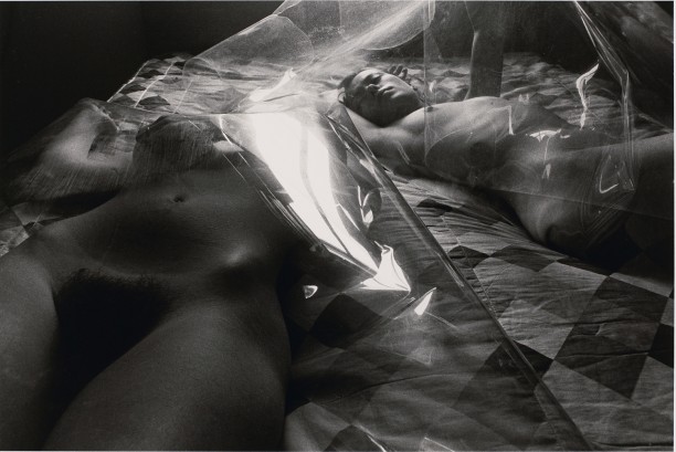 Untitled: Two Women on Bed Under Plastic