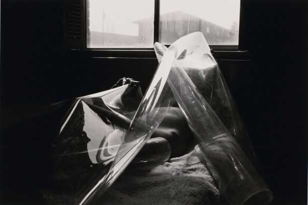 Untitled: Reclining Woman Holding Plastic