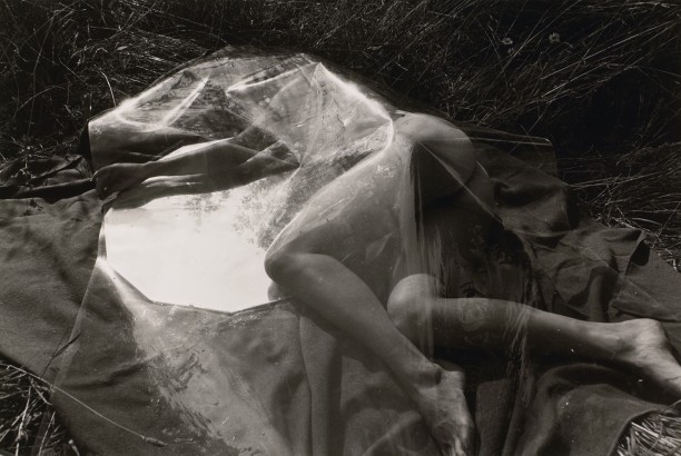 Untitled: Woman Resting Under Plastic with Mirror