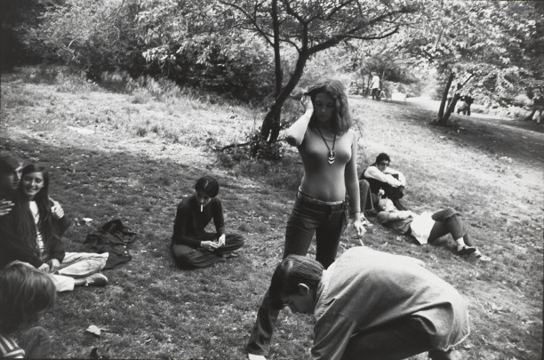 Untitled (A group of people hanging out in a park)