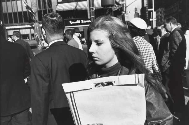 Untitled (Woman in profile walking down street)