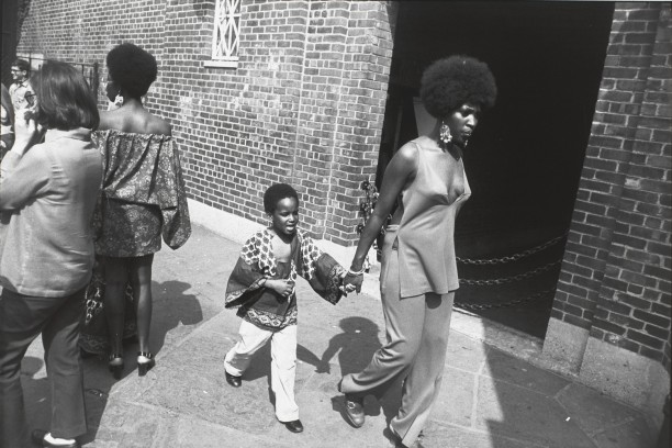 Untitled (Woman walking with a young boy)