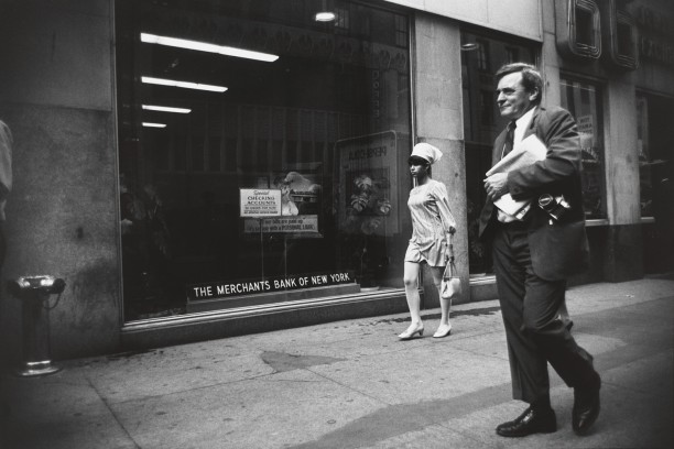Untitled (Woman passing in front of