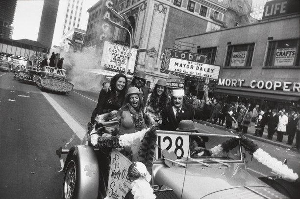 Untitled (A group of men and women riding in the St. Patrick's Day Parade, Chicago)