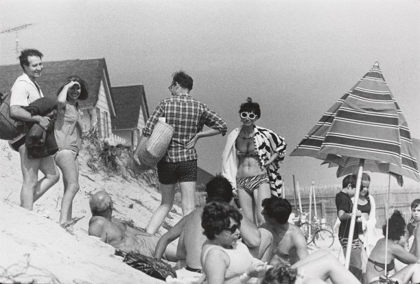 Untitled (A group of people on a beach dune)