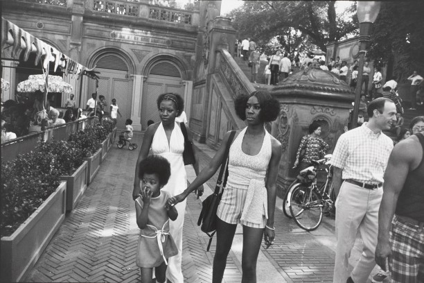 Untitled (Two women, one holding a young girl's hand)