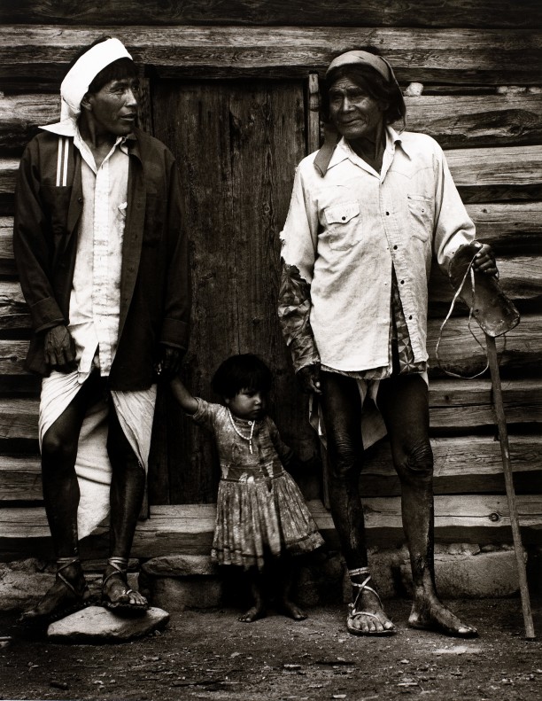 Little Girl Between Two Indians